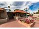 Inviting community entrance with well-manicured landscaping at 7000 N Via Camello Del Sur -- # 37, Scottsdale, AZ 85258