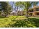 Community grounds with lush lawns and mature trees at 7000 N Via Camello Del Sur -- # 37, Scottsdale, AZ 85258