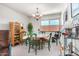 Charming dining area with a round table and green chairs at 7000 N Via Camello Del Sur -- # 37, Scottsdale, AZ 85258