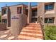 Condo building exterior with stairs and landscaping at 7000 N Via Camello Del Sur -- # 37, Scottsdale, AZ 85258
