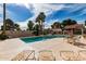 Community pool with surrounding patio and seating at 7000 N Via Camello Del Sur -- # 37, Scottsdale, AZ 85258