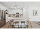 Modern kitchen with stainless steel appliances and island at 7636 W Minton St, Laveen, AZ 85339