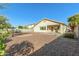 Landscaped backyard with patio and gravel yard at 8411 W Myrtle Ave, Glendale, AZ 85305