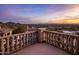 Balcony with stone balustrade and mountain views at sunset at 10040 E Happy Valley Rd # 512, Scottsdale, AZ 85255
