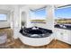 Luxurious bathroom with corner jetted tub and mountain views at 10040 E Happy Valley Rd # 512, Scottsdale, AZ 85255
