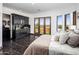 Bedroom with private access to backyard and pool at 10040 E Happy Valley Rd # 512, Scottsdale, AZ 85255