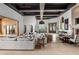 Spacious living area with high ceilings, fireplace and access to patio at 10040 E Happy Valley Rd # 512, Scottsdale, AZ 85255