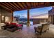 Covered patio with seating and mountain views at 10040 E Happy Valley Rd # 512, Scottsdale, AZ 85255