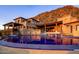 Stunning pool reflecting the home and mountain views at 10040 E Happy Valley Rd # 512, Scottsdale, AZ 85255