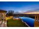 Expansive infinity pool and spa with city views at sunset at 10040 E Happy Valley Rd # 512, Scottsdale, AZ 85255