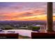 Infinity pool and patio with breathtaking sunset views at 10040 E Happy Valley Rd # 512, Scottsdale, AZ 85255