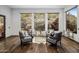 Cozy sitting area with hardwood floors and natural light at 10040 E Happy Valley Rd # 512, Scottsdale, AZ 85255
