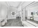 Large bathroom with double vanity, walk-in shower, and soaking tub at 11438 N 70Th St, Scottsdale, AZ 85254