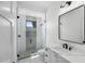Modern bathroom with white vanity, a walk-in shower, and stylish fixtures at 11438 N 70Th St, Scottsdale, AZ 85254