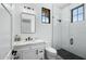 Clean bathroom with white subway tile, modern vanity and patterned floor at 11438 N 70Th St, Scottsdale, AZ 85254