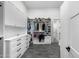 Spacious walk-in closet with ample shelving and drawer space at 11438 N 70Th St, Scottsdale, AZ 85254