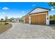 Paved driveway leading to a home with a large garage at 11438 N 70Th St, Scottsdale, AZ 85254