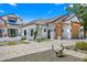 Modern farmhouse with a large garage and landscaping at 11438 N 70Th St, Scottsdale, AZ 85254