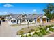 Luxury home with a large driveway and landscaping at 11438 N 70Th St, Scottsdale, AZ 85254