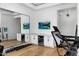 Home gym with state-of-the-art equipment and mirrored wall at 11438 N 70Th St, Scottsdale, AZ 85254