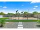 Spacious horse enclosure with sand flooring and artificial turf at 11438 N 70Th St, Scottsdale, AZ 85254