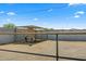 Two donkeys in a corral with shade structure at 11438 N 70Th St, Scottsdale, AZ 85254