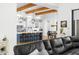 Modern kitchen with white cabinets, a blue island, and wood beams at 11438 N 70Th St, Scottsdale, AZ 85254