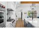 Modern kitchen with stainless steel appliances and a white and blue color scheme at 11438 N 70Th St, Scottsdale, AZ 85254