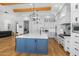 Open concept kitchen with large island and hardwood floors at 11438 N 70Th St, Scottsdale, AZ 85254