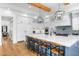 Modern kitchen with a large island and white cabinets at 11438 N 70Th St, Scottsdale, AZ 85254