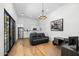 Home office with kitchenette, hardwood floors, and modern furniture at 11438 N 70Th St, Scottsdale, AZ 85254
