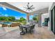 Outdoor patio with seating area, built-in grill, and pool view at 11438 N 70Th St, Scottsdale, AZ 85254