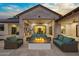 Large patio area with fire pit and comfortable seating at 11438 N 70Th St, Scottsdale, AZ 85254