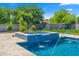 Relaxing spa with water features and tiled accents at 11438 N 70Th St, Scottsdale, AZ 85254