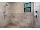 Shower with marble tile and rainfall shower head at 11885 N Sunset Vista Dr, Fountain Hills, AZ 85268