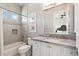 Clean bathroom with a bathtub, toilet and a vanity at 11885 N Sunset Vista Dr, Fountain Hills, AZ 85268
