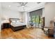 Bright bedroom with hardwood floors and window seat at 11885 N Sunset Vista Dr, Fountain Hills, AZ 85268