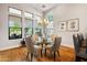 Charming breakfast nook with glass table and four chairs at 11885 N Sunset Vista Dr, Fountain Hills, AZ 85268