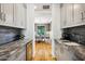 Butler's pantry with wine cooler, coffee bar, and ample storage at 11885 N Sunset Vista Dr, Fountain Hills, AZ 85268