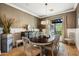 Elegant dining room with oval table and hardwood floors at 11885 N Sunset Vista Dr, Fountain Hills, AZ 85268