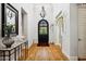 Elegant entryway with high ceilings, hardwood floors, and a chandelier at 11885 N Sunset Vista Dr, Fountain Hills, AZ 85268