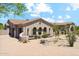 Front view of a beautiful home with a landscaped yard at 11885 N Sunset Vista Dr, Fountain Hills, AZ 85268