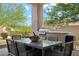 Outdoor kitchen and dining area with built-in grill at 11885 N Sunset Vista Dr, Fountain Hills, AZ 85268