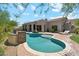 Stunning pool area with a brick water feature at 11885 N Sunset Vista Dr, Fountain Hills, AZ 85268