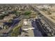Aerial view of the house, neighborhood, and park at 1340 E Kingman Pl, Casa Grande, AZ 85122