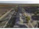 Aerial view showcasing the house and surrounding neighborhood at 1340 E Kingman Pl, Casa Grande, AZ 85122