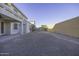 Spacious backyard with gravel and a block wall at 1340 E Kingman Pl, Casa Grande, AZ 85122