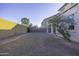 Large backyard with gravel landscaping and privacy wall at 1340 E Kingman Pl, Casa Grande, AZ 85122