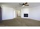 Primary bedroom with fireplace and ensuite access at 1340 E Kingman Pl, Casa Grande, AZ 85122