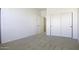 Spacious bedroom with double door closet and neutral carpet at 1340 E Kingman Pl, Casa Grande, AZ 85122